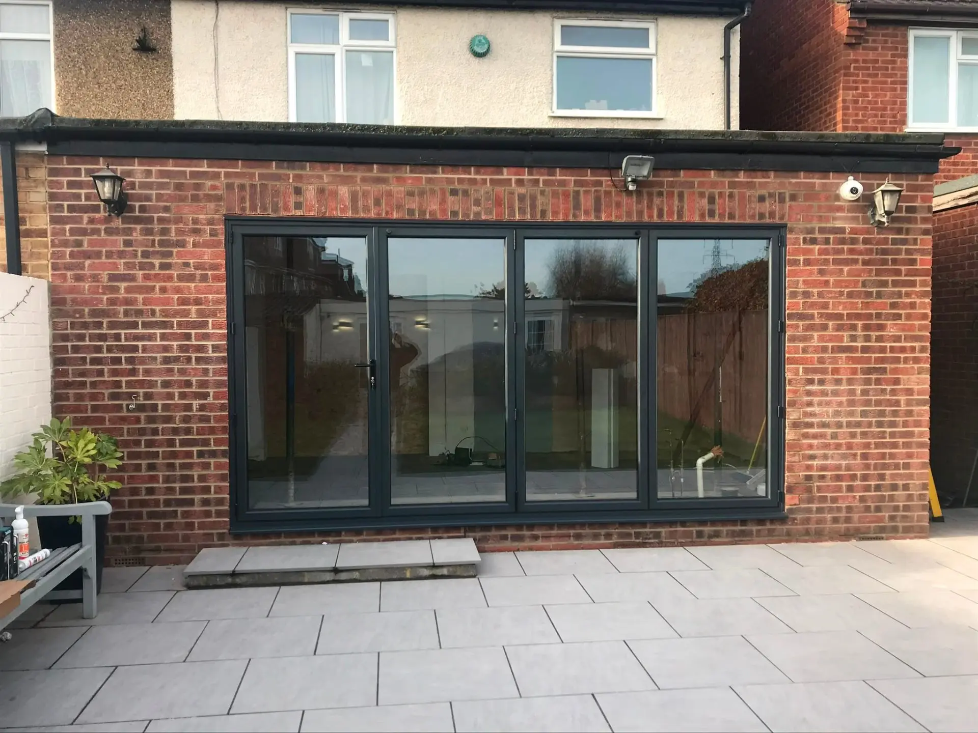 Anthracite grey aluminium bi-fold doors fitted by Rural Windows across Chester & North Wales