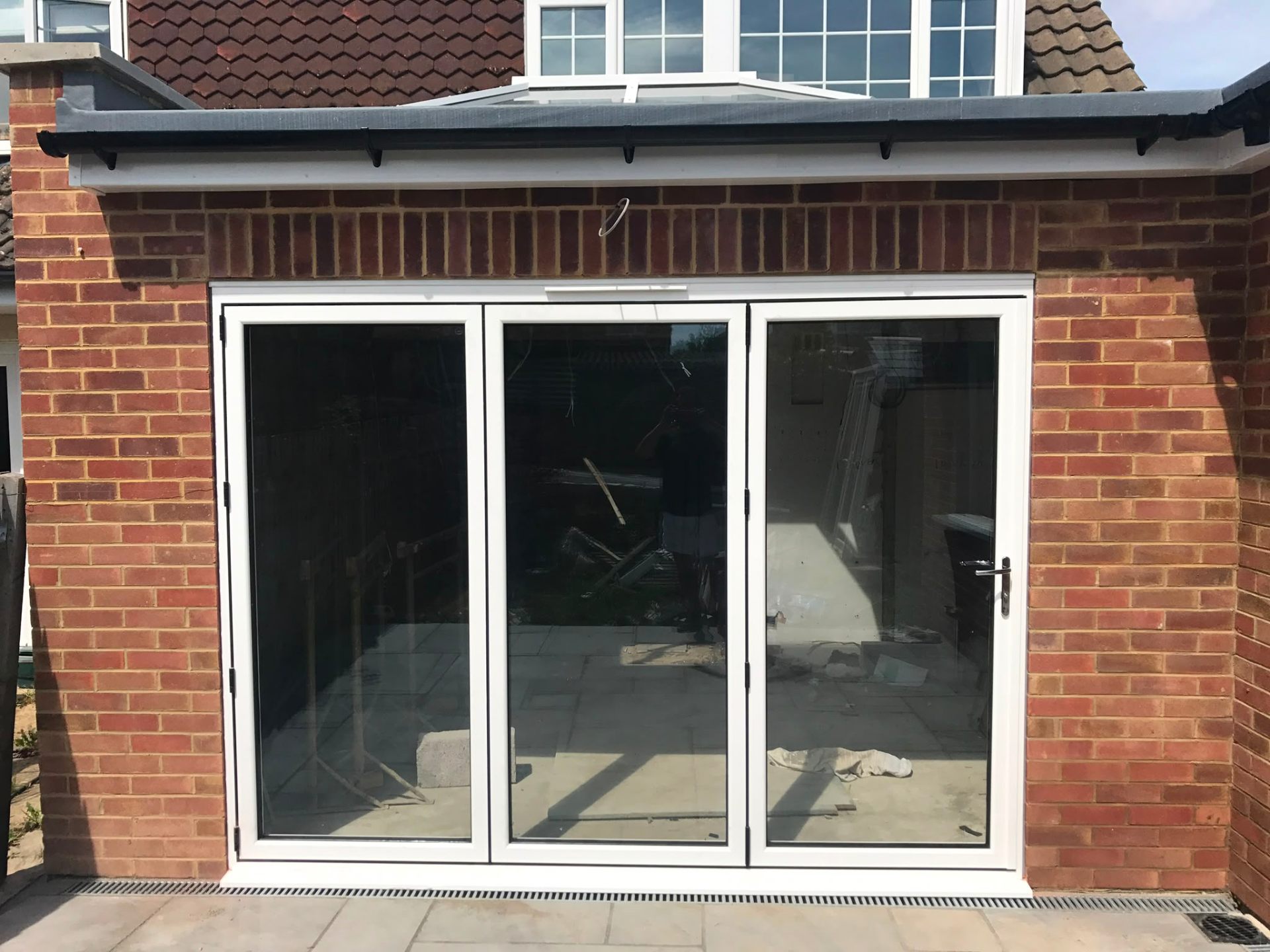 Aluminium bi-fold doors installation by Rural Windows in Chester & North Wales